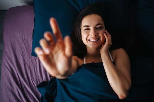 young-beautiful-woman-morning-bed-home-positive-cheerful-woman-smile-touch-her-face-show-blurred-hand-picture-concentrated-woman_186523-67.jpg